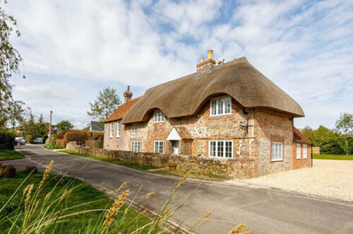 Grade II listed thatched residential property in West Sussex