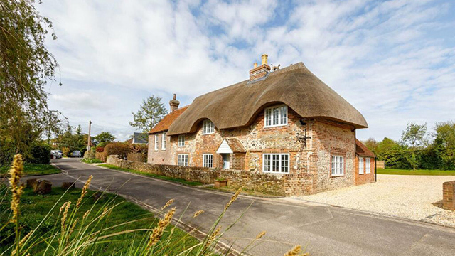 Grade II listed thatched residential property in West Sussex